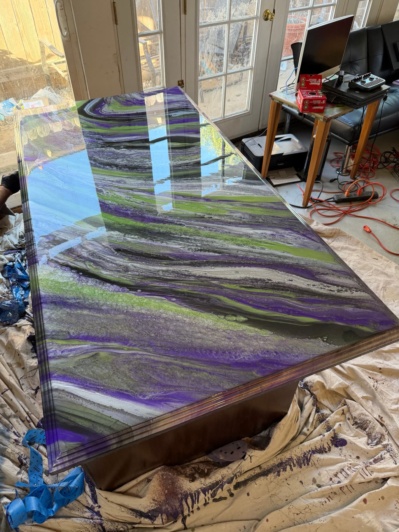 Glossy purple, green and silver epoxy resin dining table top